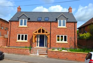 Main Elevation- click for photo gallery